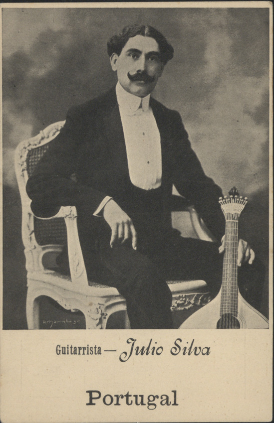 MARINHO, José Pires, 1857-1929?<br/>Julio Silva, guitarrista / PMarinho gr.. - [S.l. : s.n., ca 1915?]. - 1 postal : p&b ; 14,5x9,5 cm